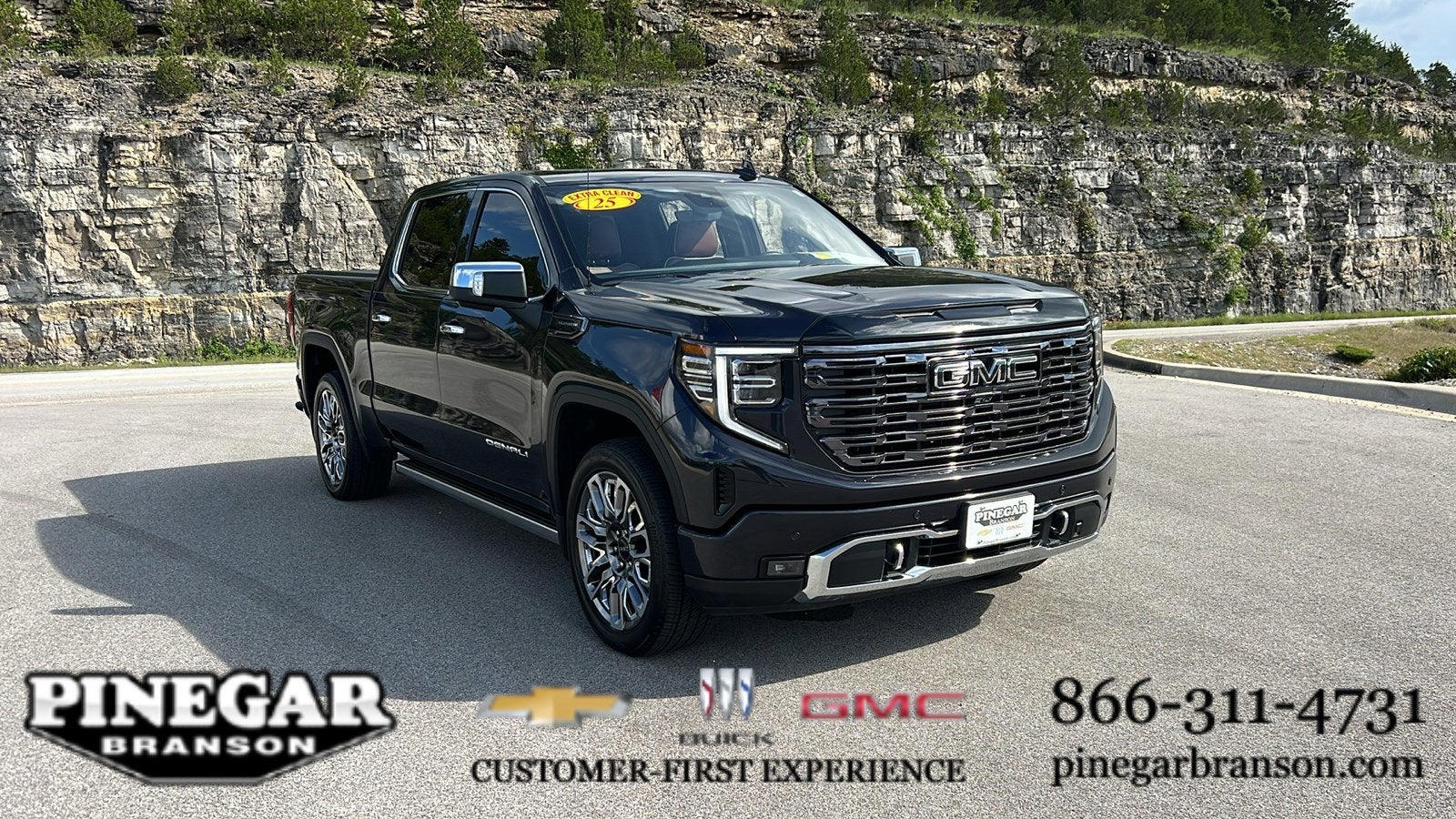 2025 GMC Sierra 1500 Denali Ultimate in Titanium Rush Metallic — front three-quarter view