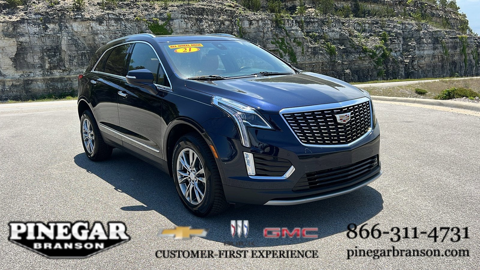 2021 Cadillac XT5 AWD Premium Luxury in Dark Moon Blue Metallic — front three-quarter view