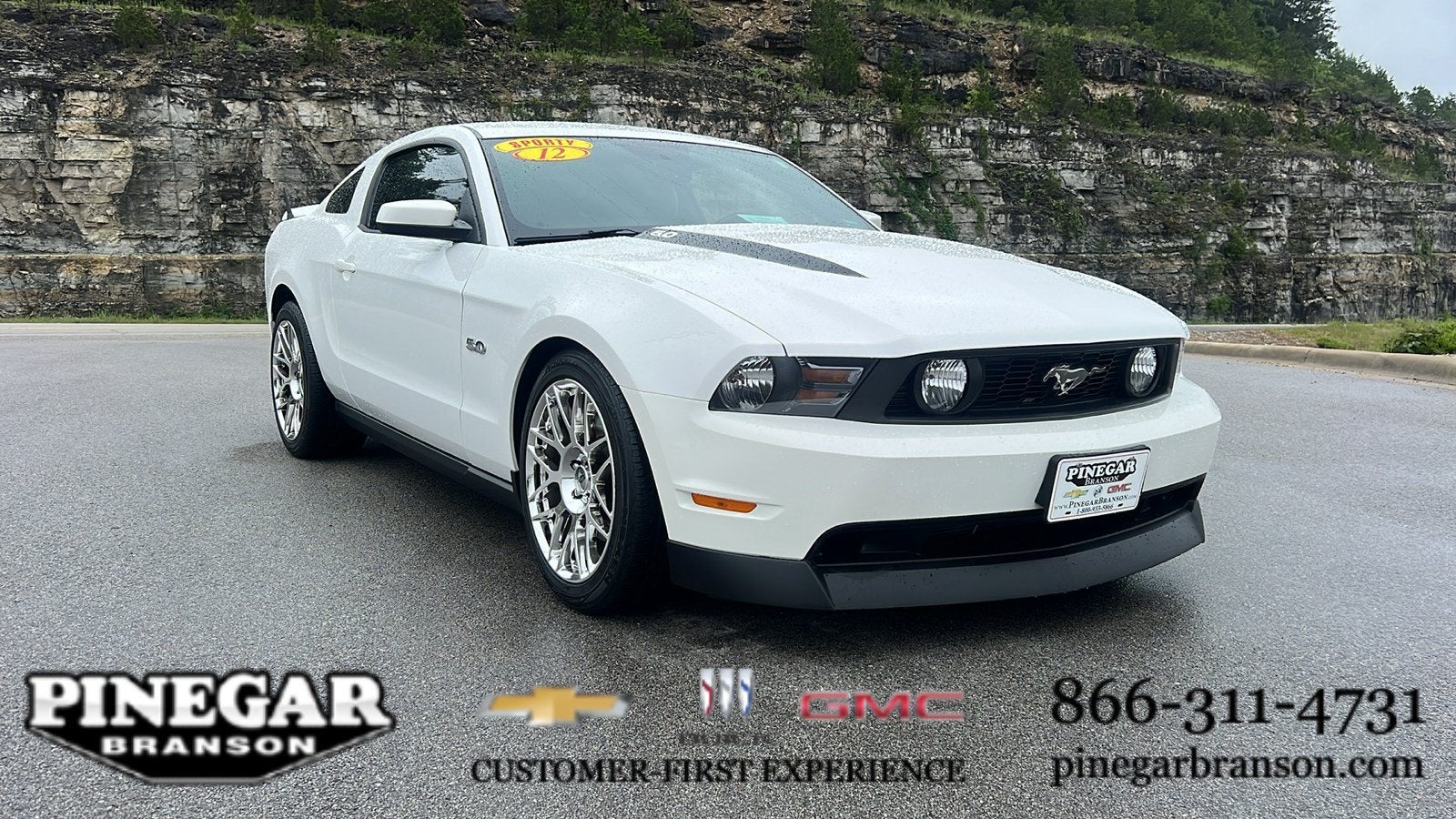 2012 Ford Mustang GT Premium in White — front three-quarter view