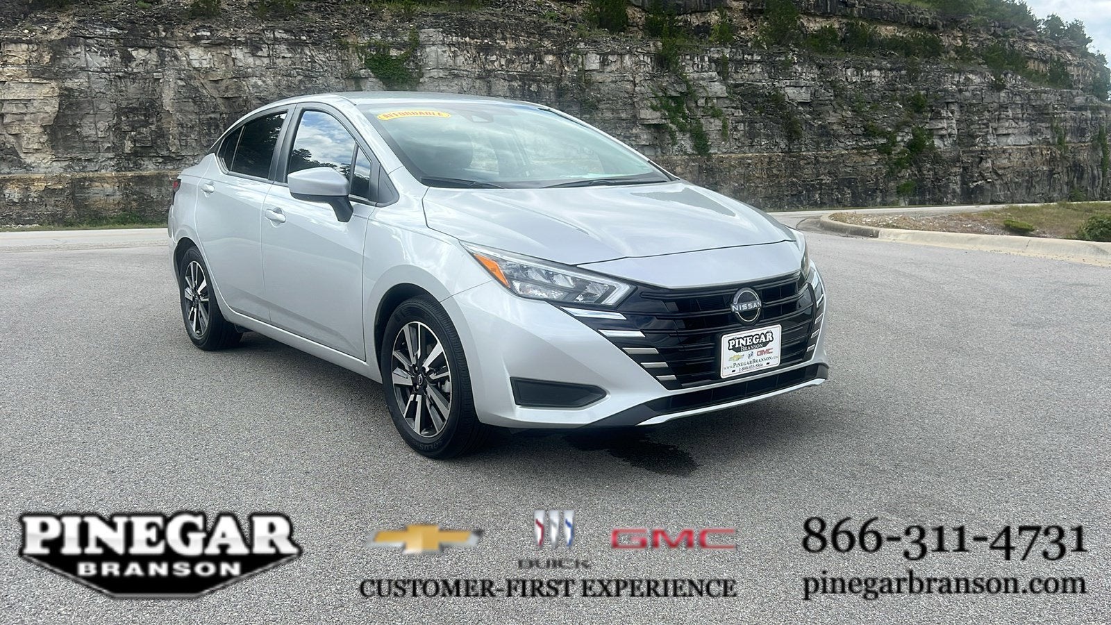 2025 Nissan Versa SV in Silver — front three-quarter view
