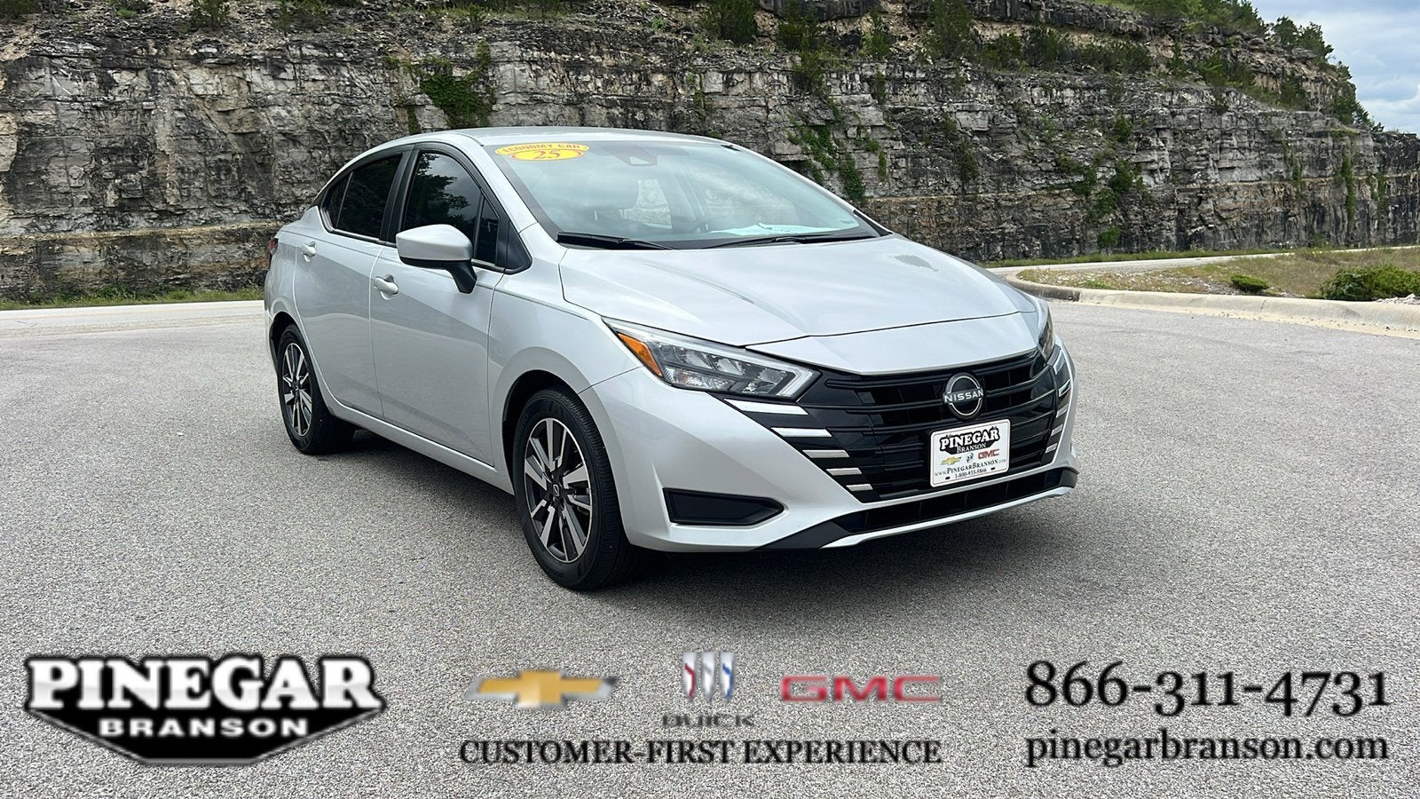 2025 Nissan Versa SV in Silver — front three-quarter view